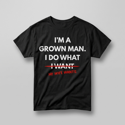 Black I do what my wife wants t-shirt flat-lay